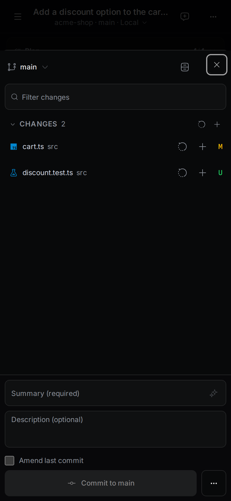 The Git changes panel on a phone with two changed files, the Summary and Description fields, and the Commit to main button